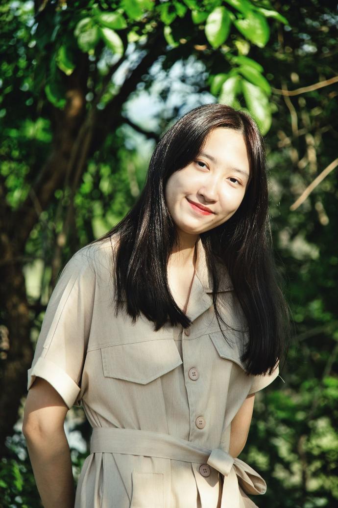 woman in brown button up shirt